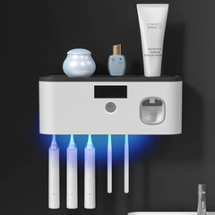 Electri toothbrush sterilizerilizar dispenser