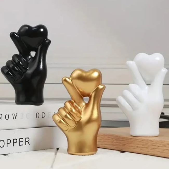 Heart hand gesture decor statue