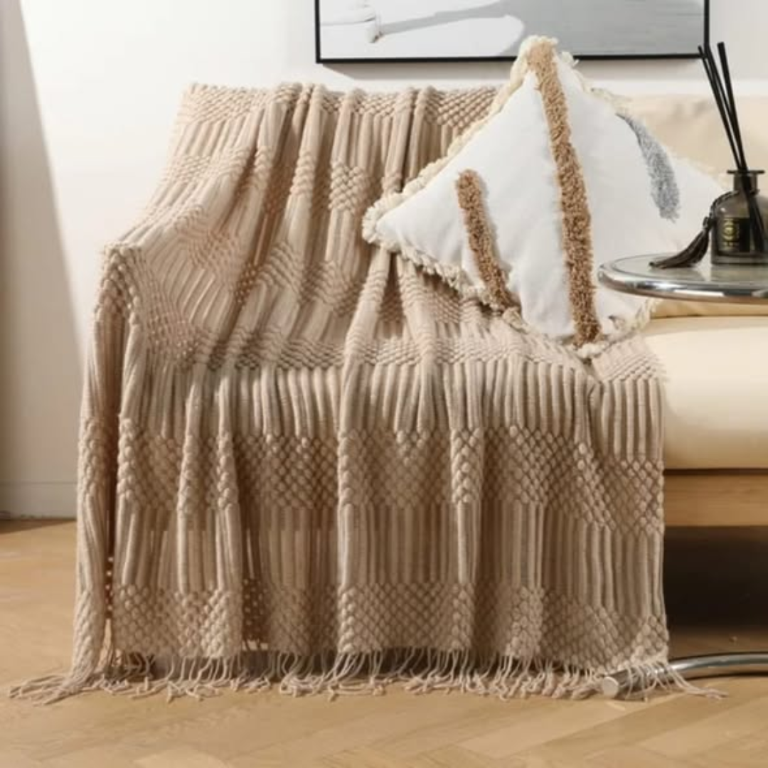 Knitted throw blanket with tassels